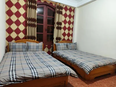 Chambre lits jumeaux Standard — Quê Hương house